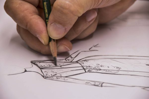 arthur caliman desenhando vestidos